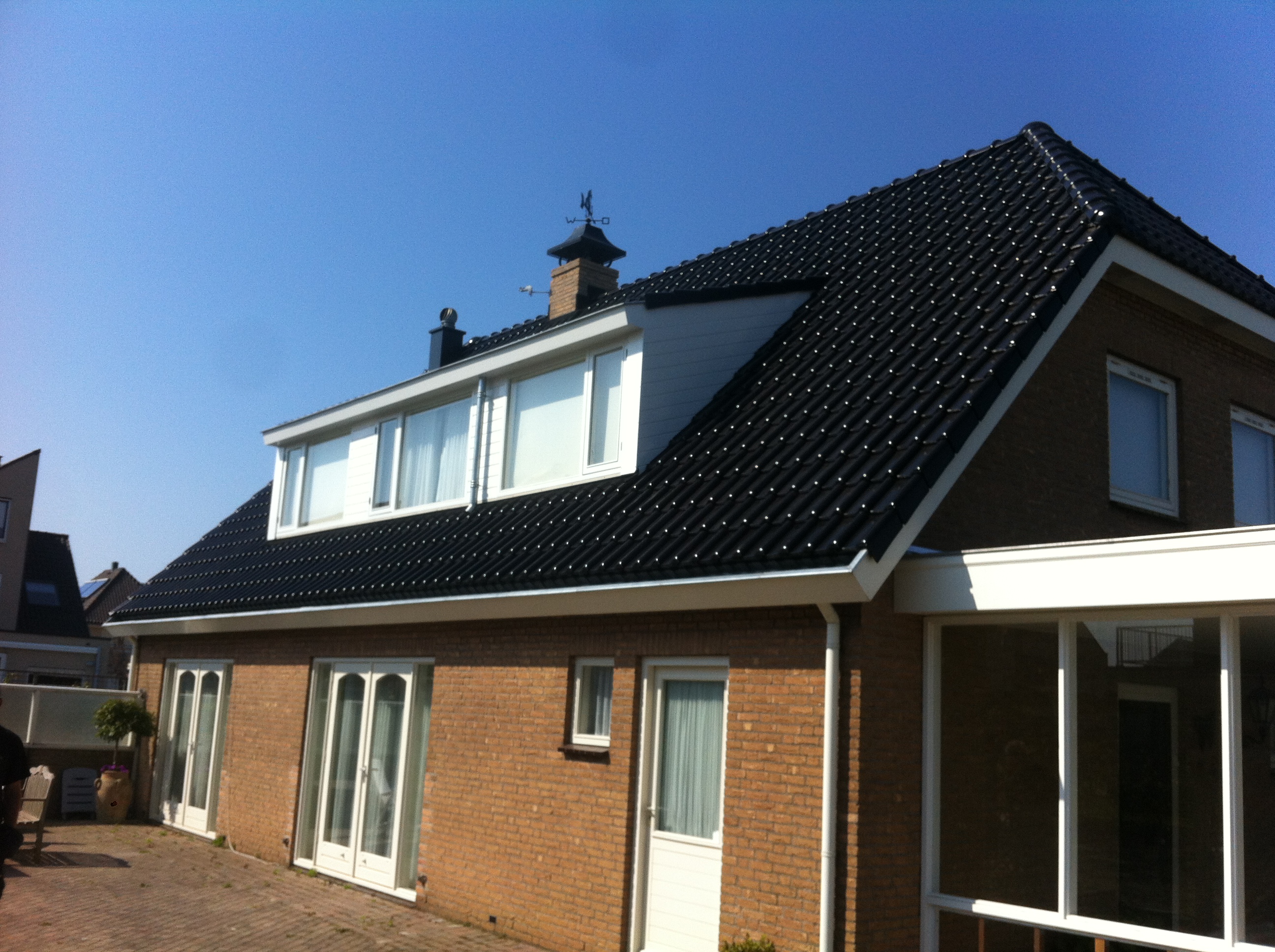 Dakrenovatie: vervangen dakpannen en aanpassen dakkapel